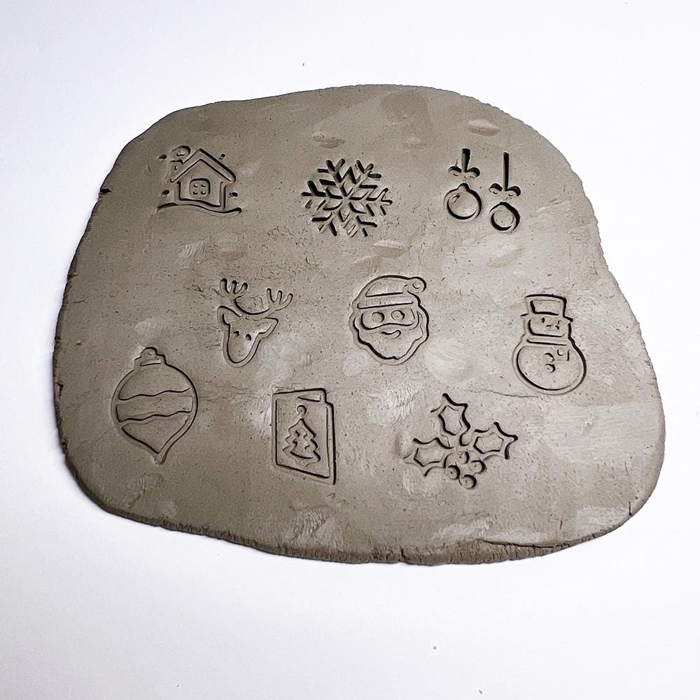 25mm floral stamps ideal for clay pottery decoration.