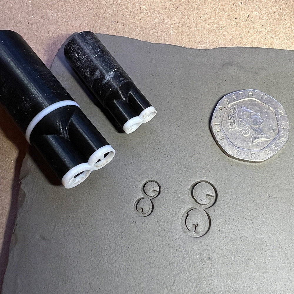 Handcrafted ceramic stamp for creating clean and consistent impressions on pottery.