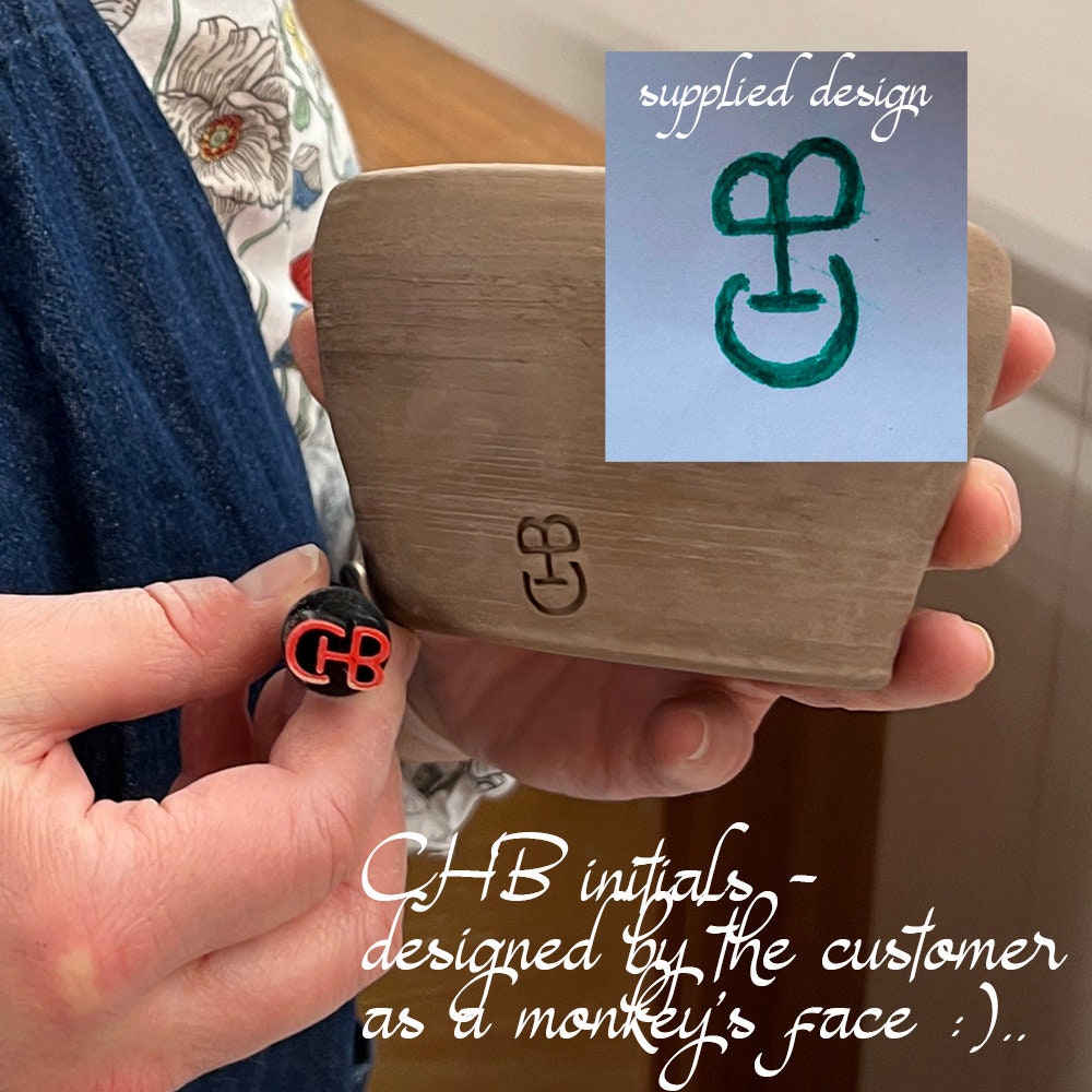 Elegant pottery stamp for creating distinct, branded impressions on ceramic pieces.