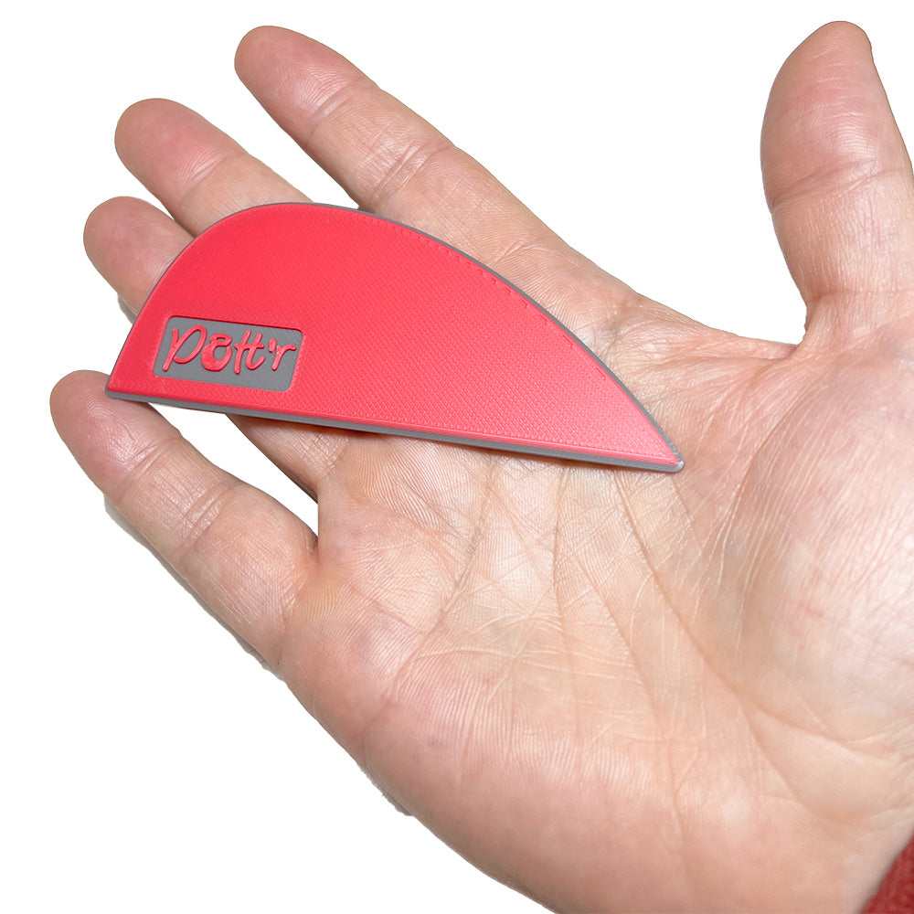 Thrower’s rib pottery tool, designed for creating smooth contours and refined edges on pottery