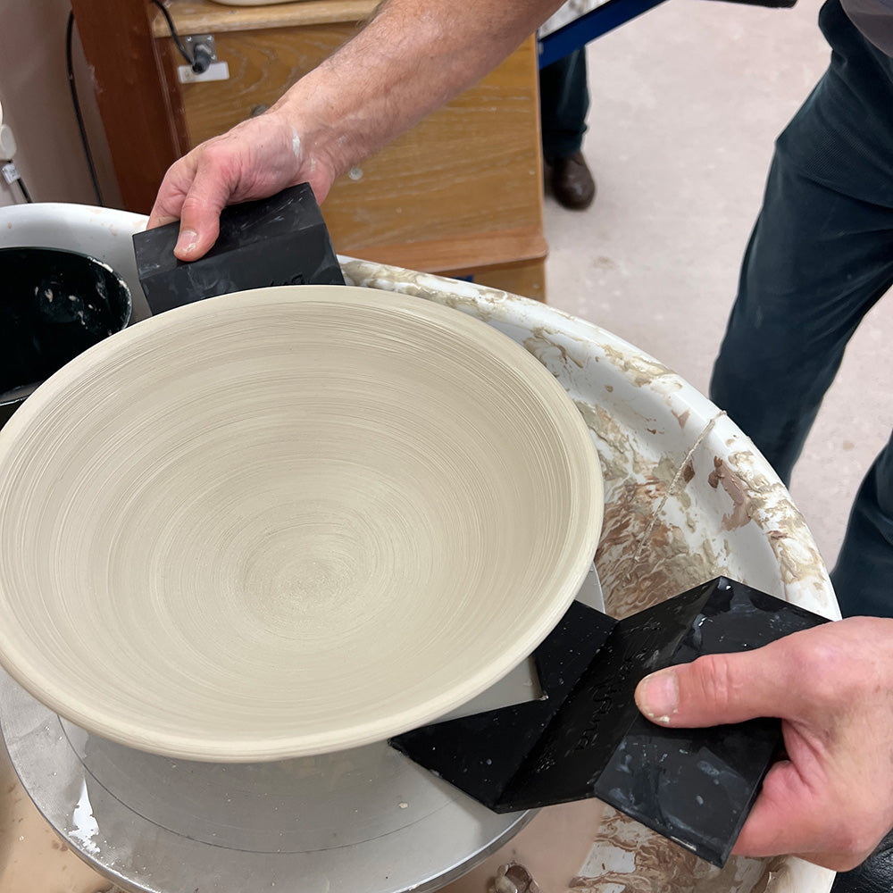 Beautifully crafted wheel-thrown pottery piece showcasing traditional clay techniques.