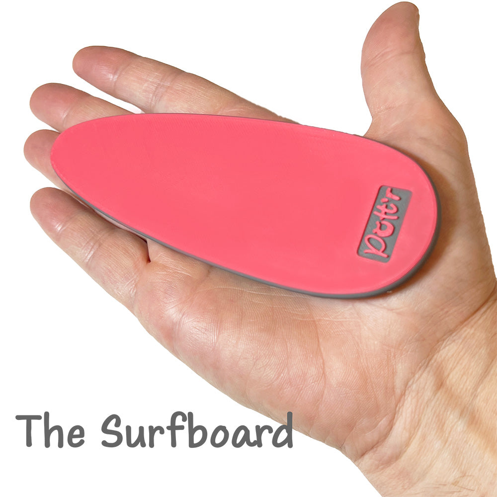 Surfboard-shaped rib pottery tool labeled, ideal for creating smooth, rounded surfaces on pottery pieces